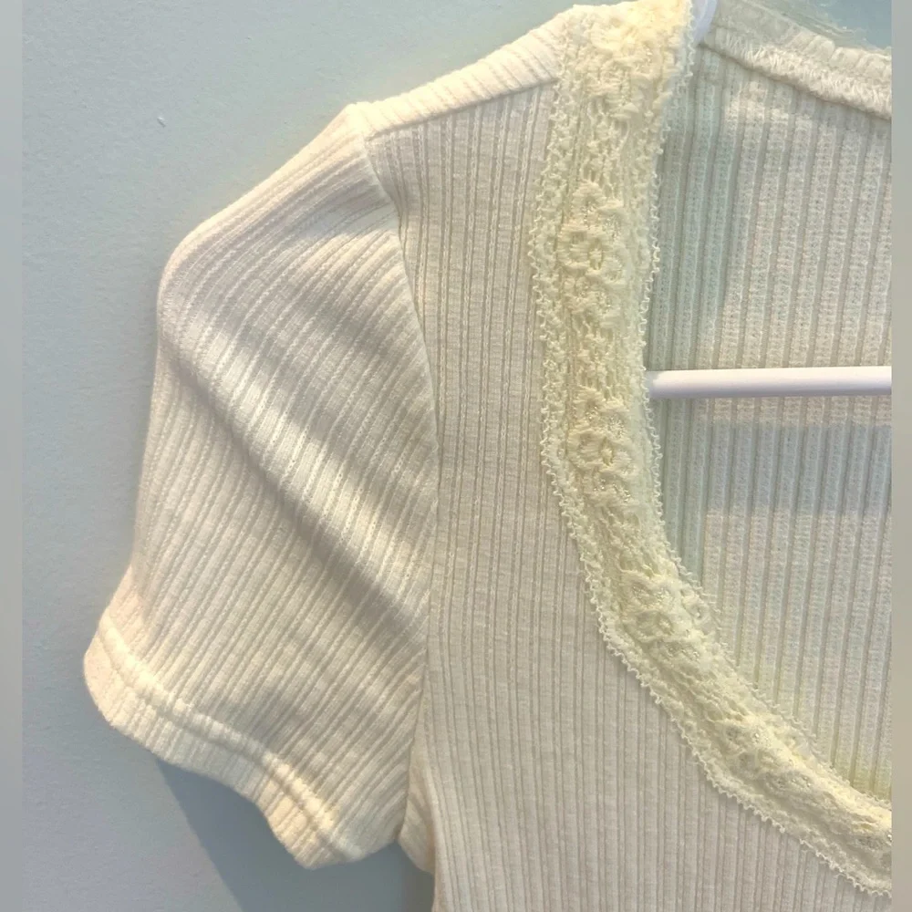 Forever 21 bodysuit with white floral pattern around neck. - Picture 5 of 5